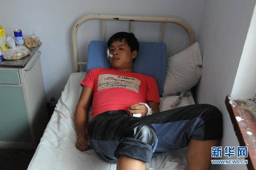 8月20日,一名傷者在醫院接受救治。 8月20日,一名傷者在醫院接受救治。